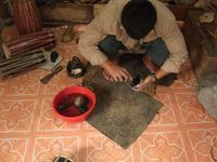 making Nepali drums