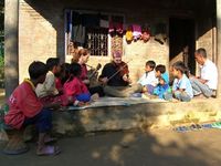 Performing small concert for village kids in the Terai region, Nepal