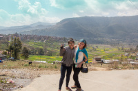 Tour member with new friend in the Kathmandu Valley, Nepal
