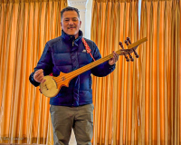 Tenam can teach us about Tibetan music and dance. 